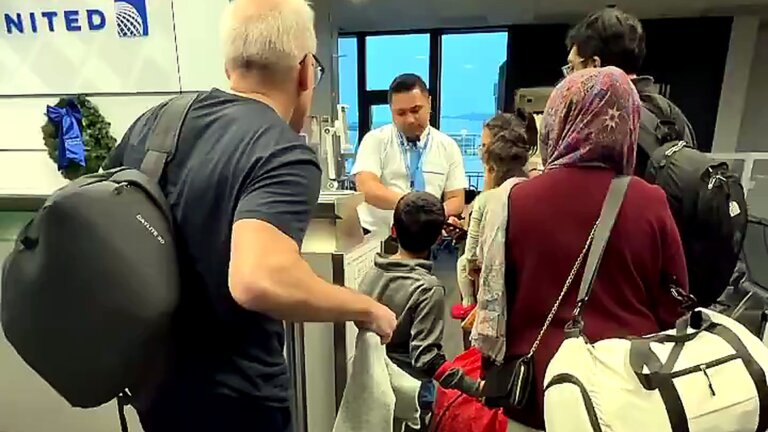Let Me Go First: United Global Services Passenger Shoves Past A Family With Toddlers During Preboarding