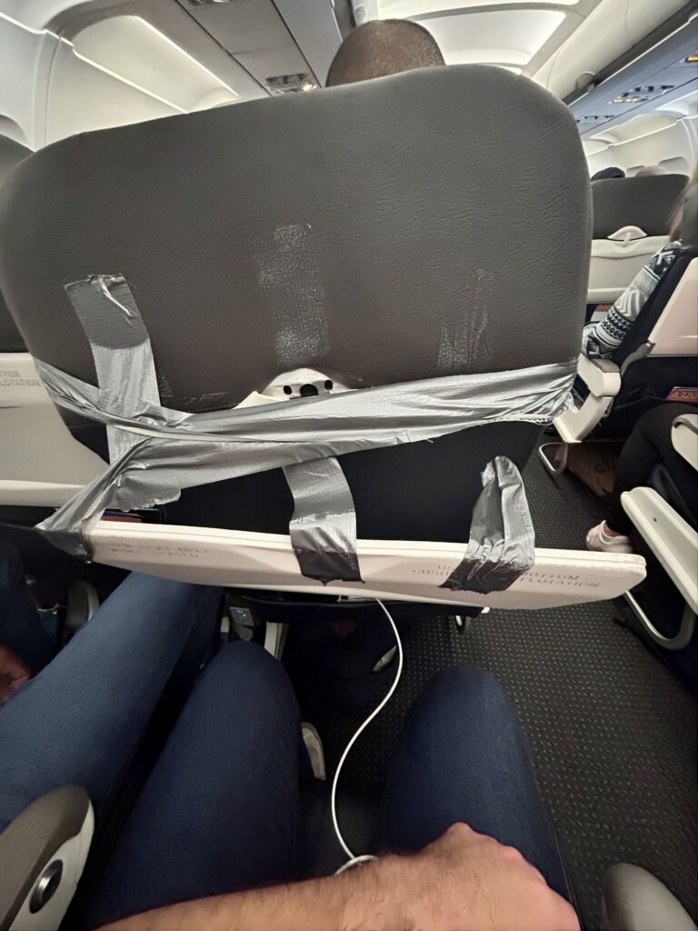 Broken Seats, Broken Armrests And Out Of Order Tray Tables — American Airlines Calls It 'Product Delivered'